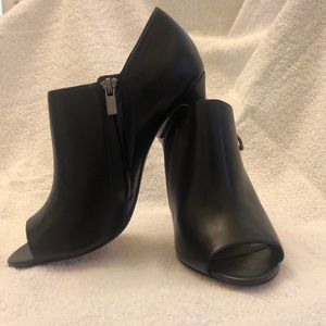 Elie Taharie leather peep toe sandals.